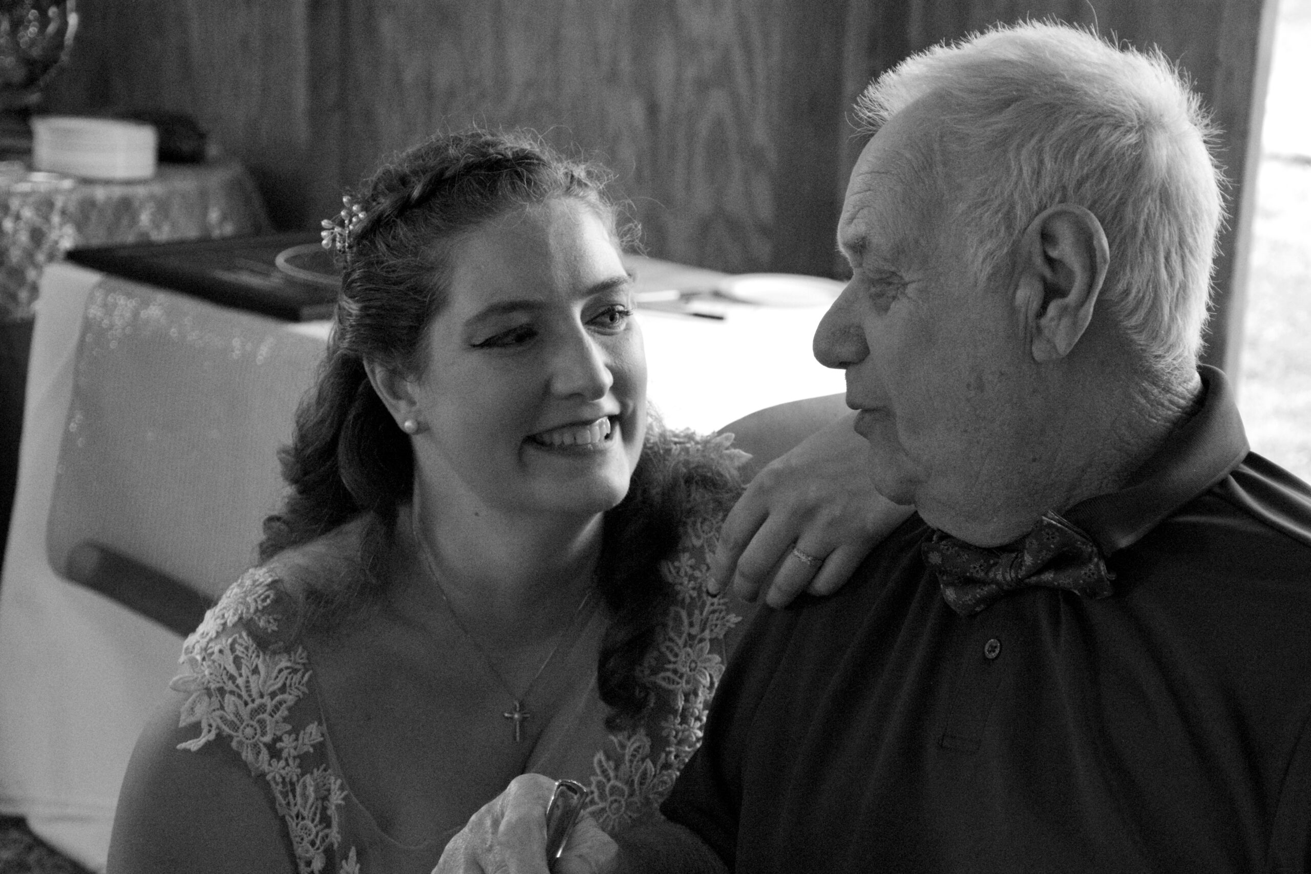 Crystal and father Joe look at each other